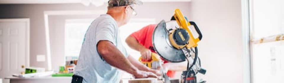 Contractor using a saw