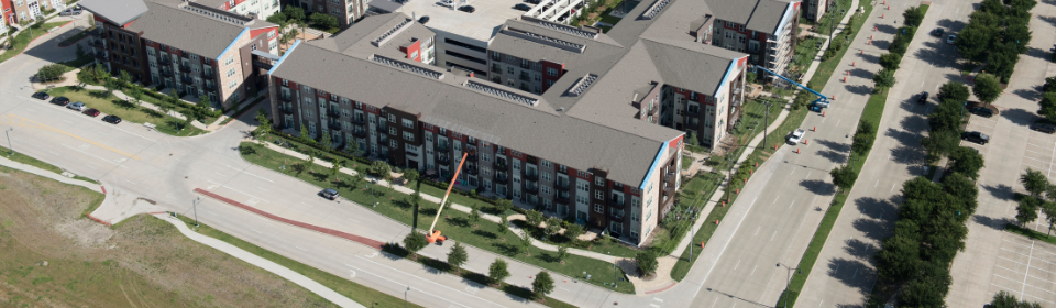 aerial view of a large garden style apartment complex