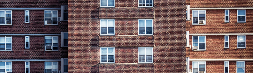 brick facing apartment building