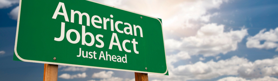 sign saying american jobs act just ahead