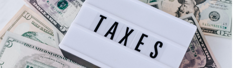 sign saying taxes